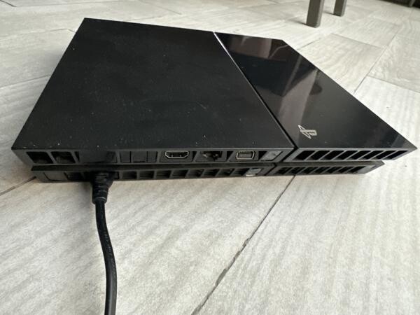 PS4 (1 TB) + 2 controllers & games - 10