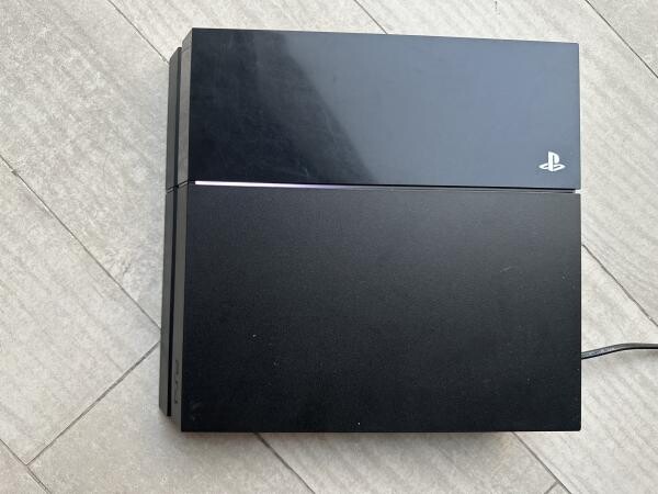 PS4 (1 TB) + 2 controllers & games - 8