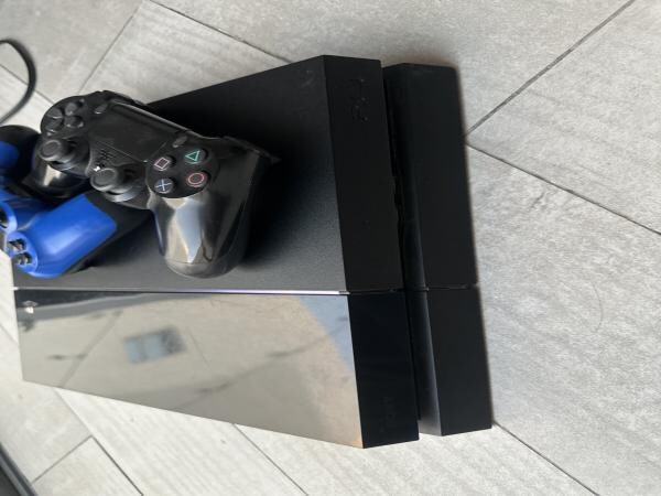 PS4 (1 TB) + 2 controllers & games - 5