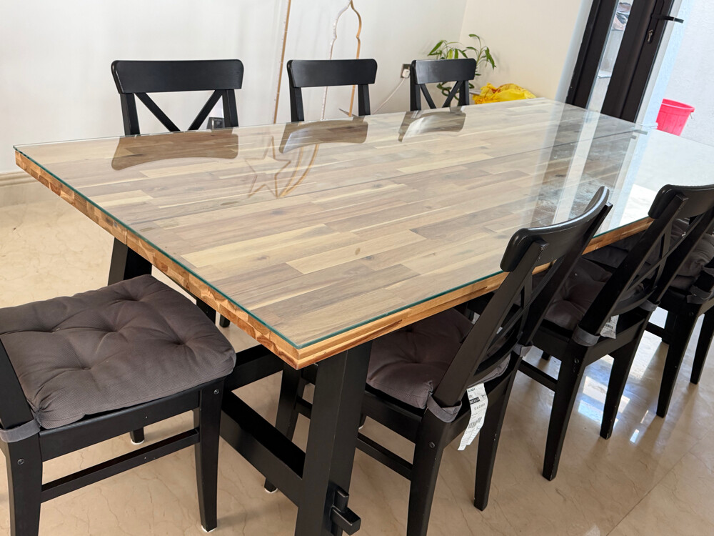 dining table in excellent condition, made from solid acacia wood with a strong black base. - 6