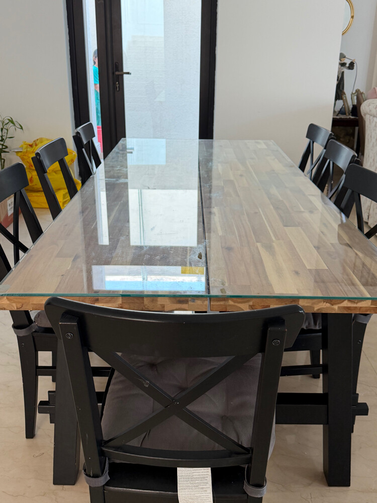 dining table in excellent condition, made from solid acacia wood with a strong black base. - 4