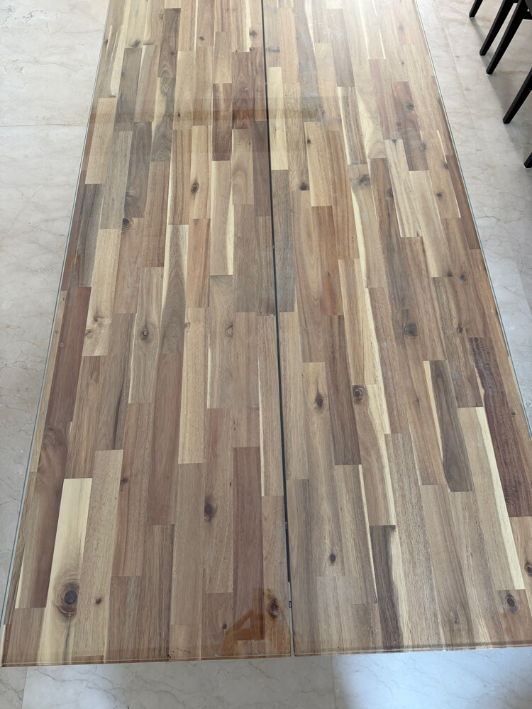 dining table in excellent condition, made from solid acacia wood with a strong black base. - 1