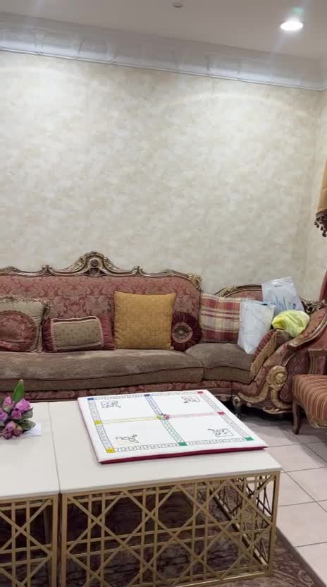 ‏sofa with all of the things  - 2