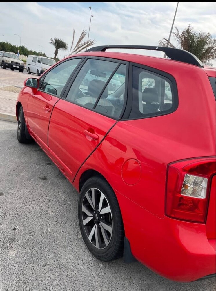Kia Carens - 2