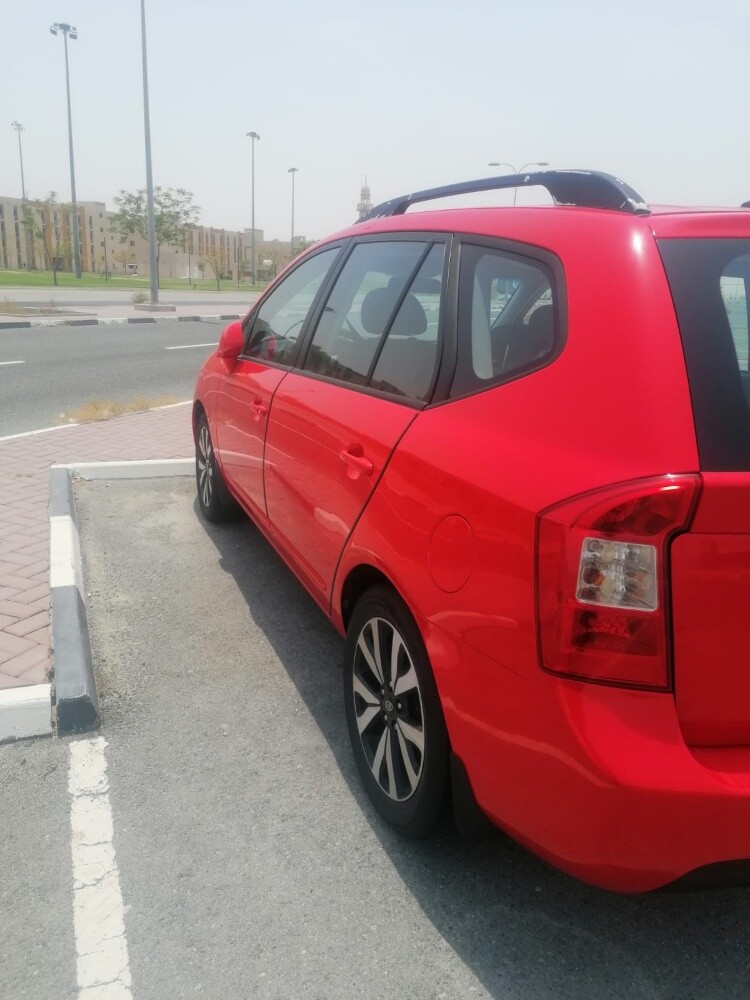 Kia Carens - 11