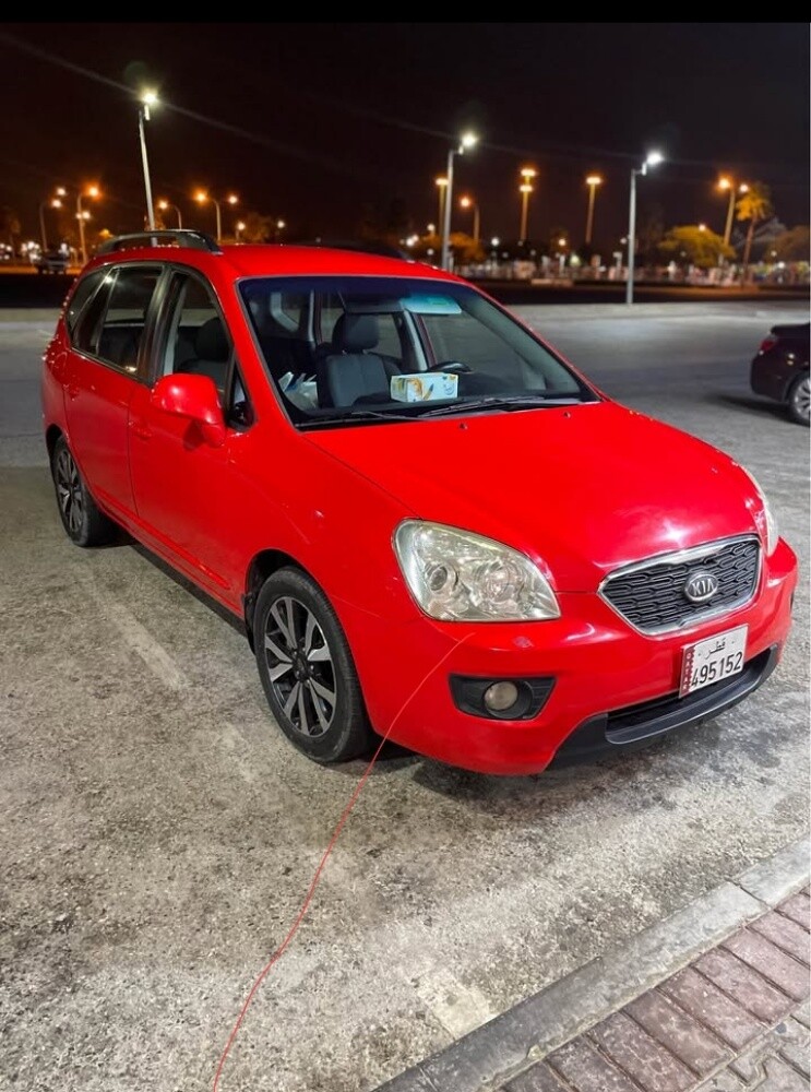Kia Carens - 4