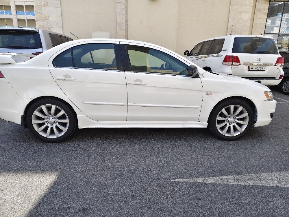 Mitsubishi   GT   lanser   2009 - 12