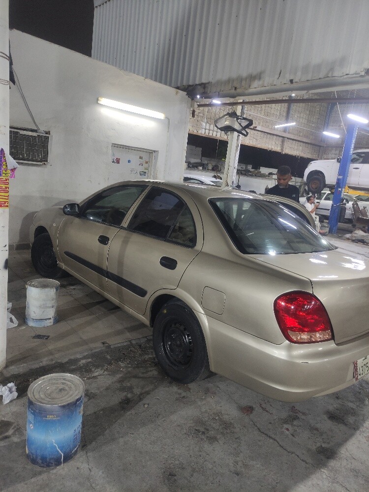 Nissan sunny 2010 - 4