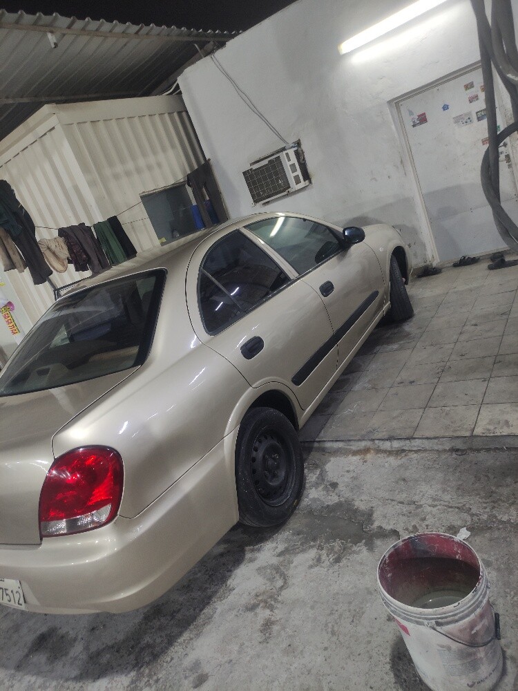 Nissan sunny 2010 - 5