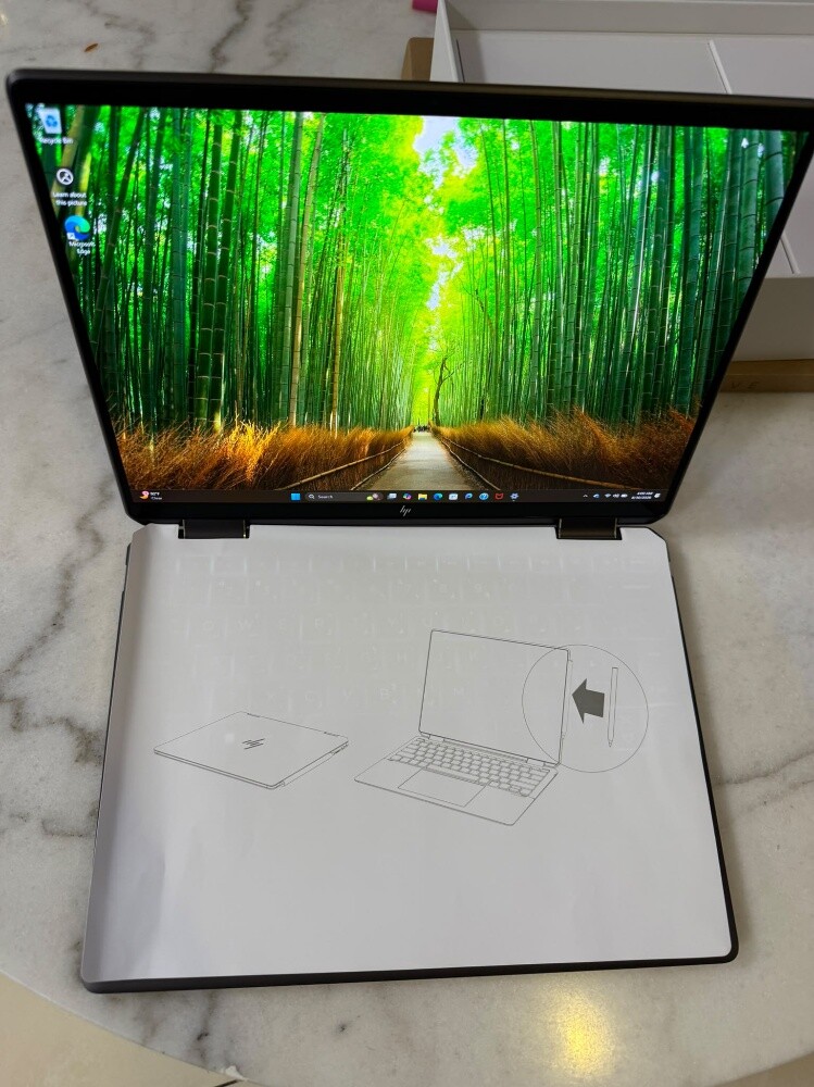 A brand-new, high-spec laptop—never - 1