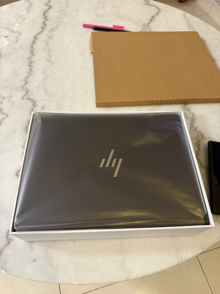 A brand-new, high-spec laptop—never - 16