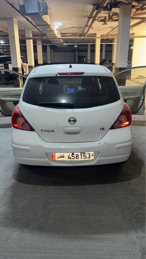tiida  - 4