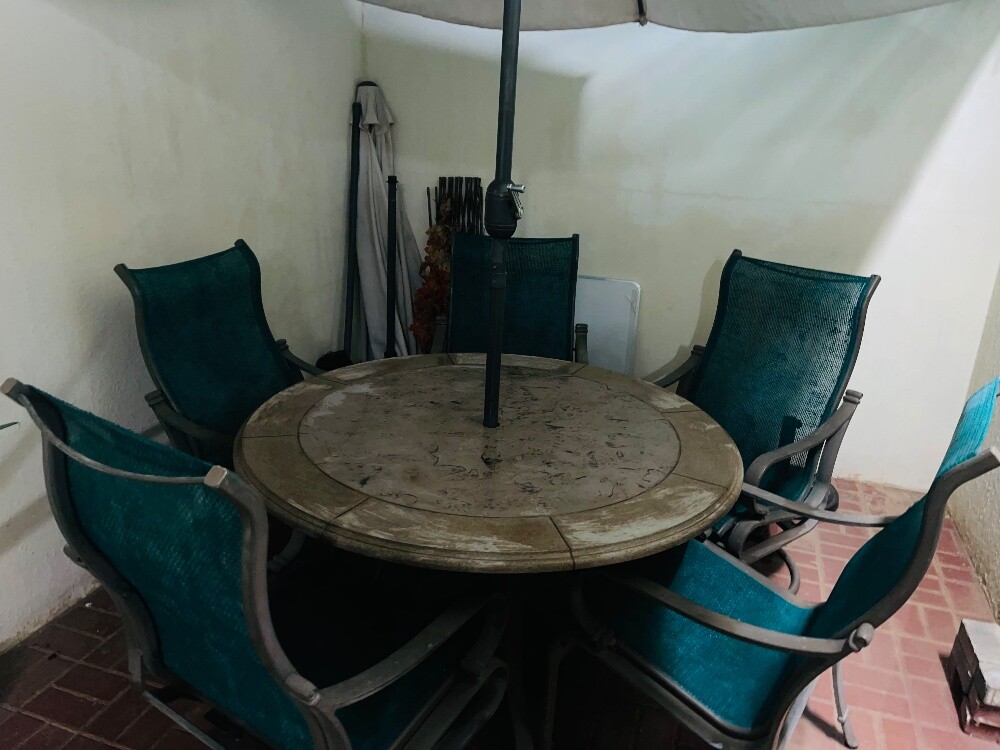 There are total five chairs, one dining table and one umbrella, it is in good condition. - 1