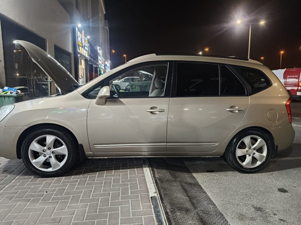 kia carens - 5