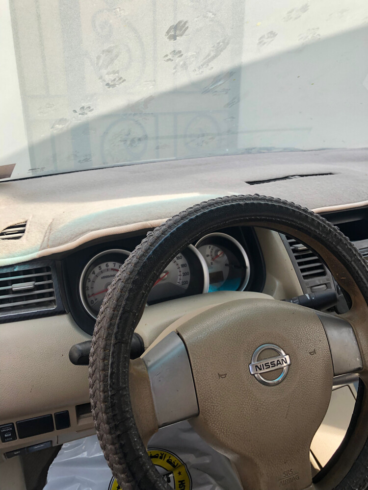 سيارة نيسان تيدا - 5