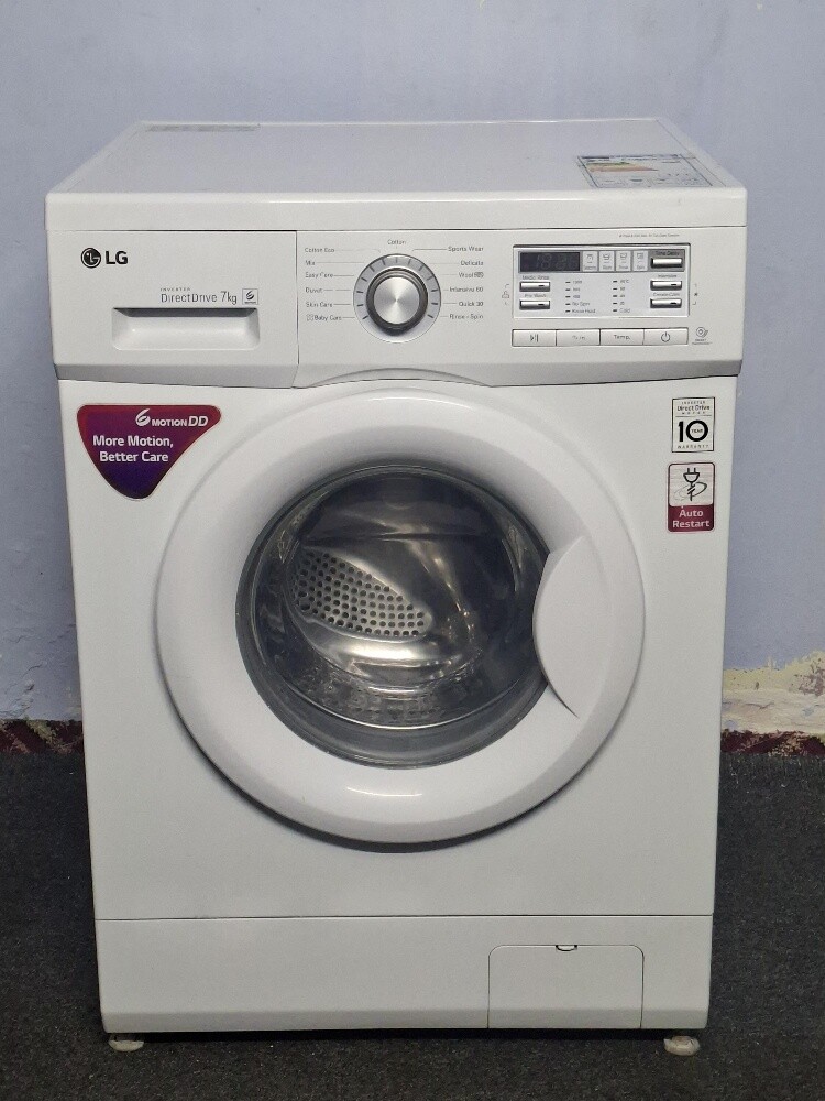 LG 7 KG WASHING MACHINE. - 1