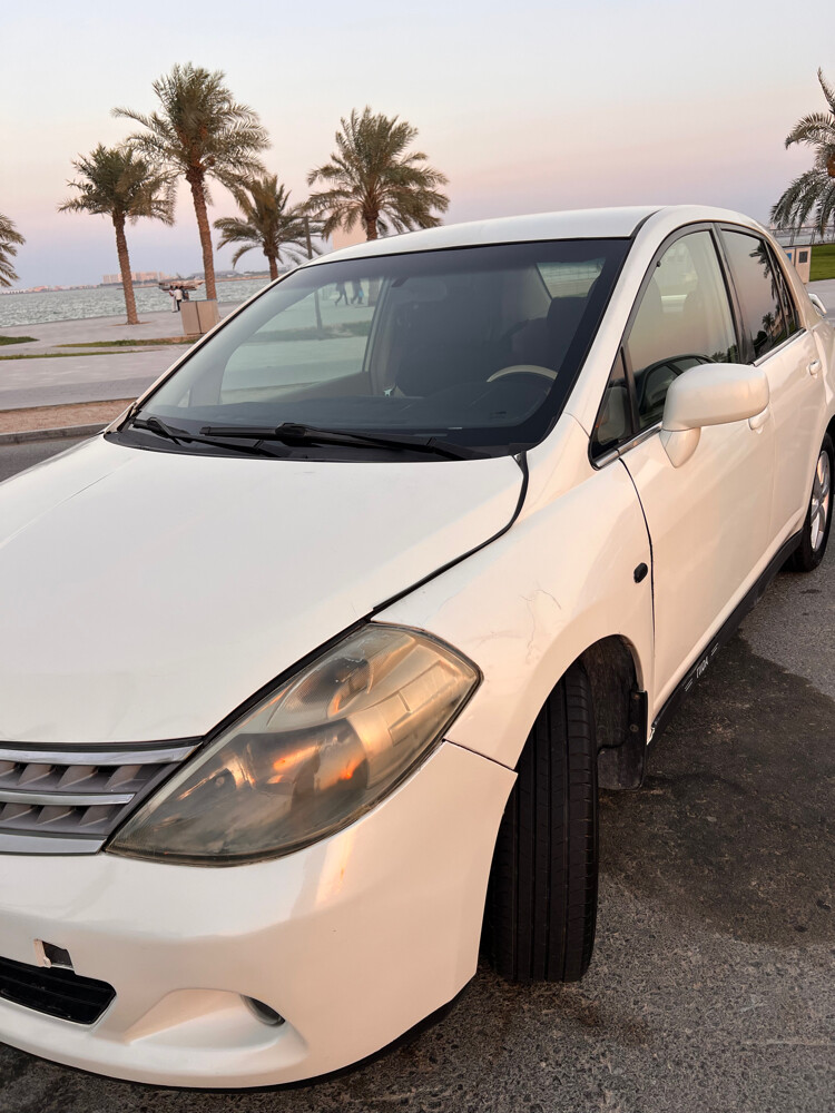 Nissan tida  - 11