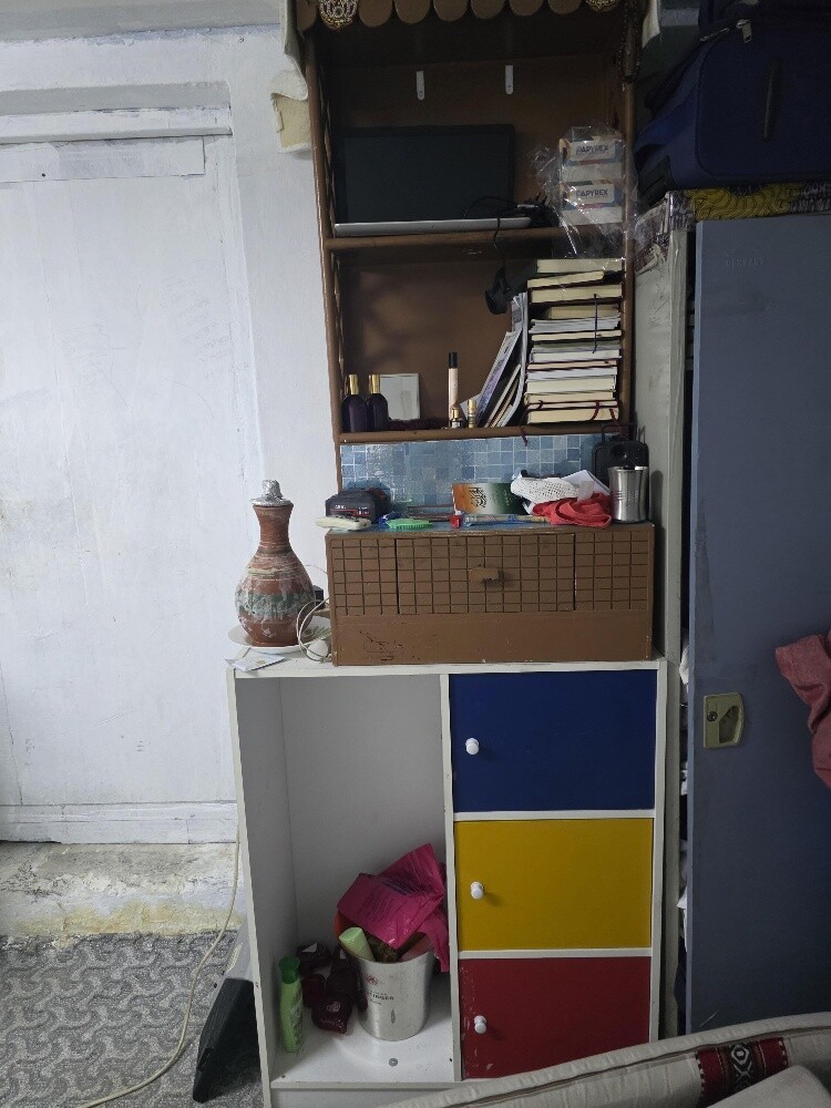 A bookcase and a cabinet—both for j - 7