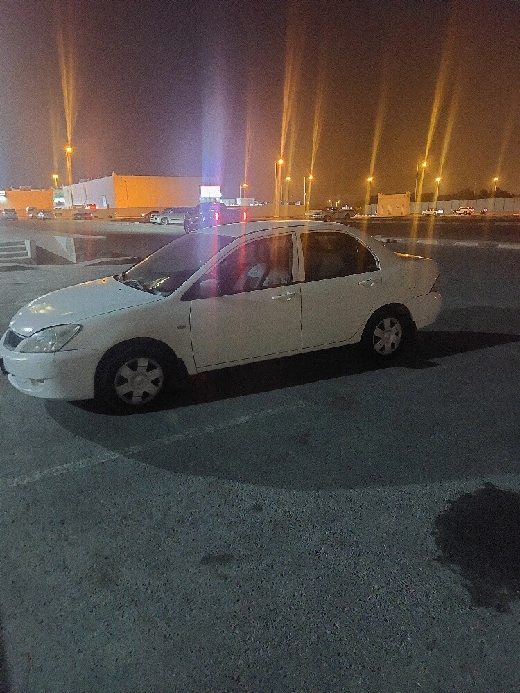 لانسر 2010 - 4