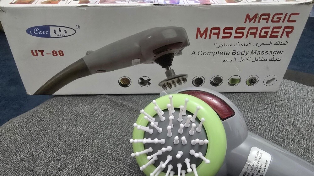 Portable body massager - 2
