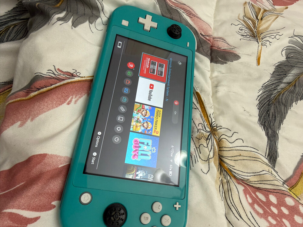 nintendo switch lite with a account - 1