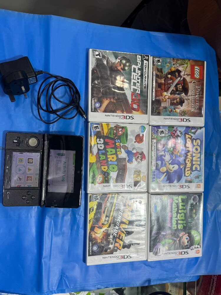 3DS gaming console with Games - 1