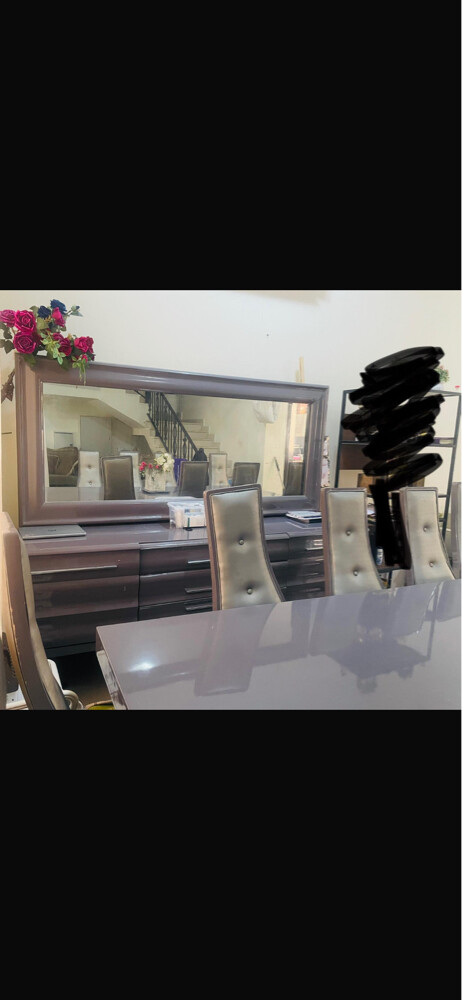 Dining table with mirrors and a boo - 2