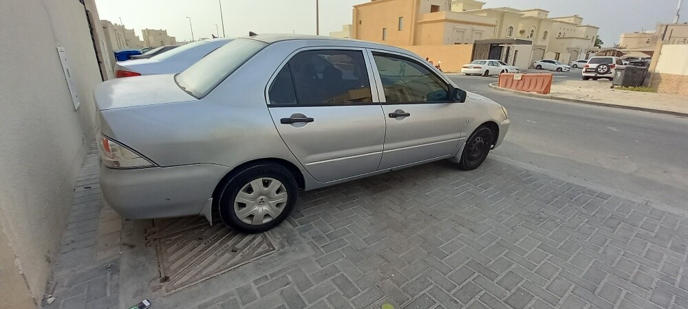 سياره لانسر 2009 - 1