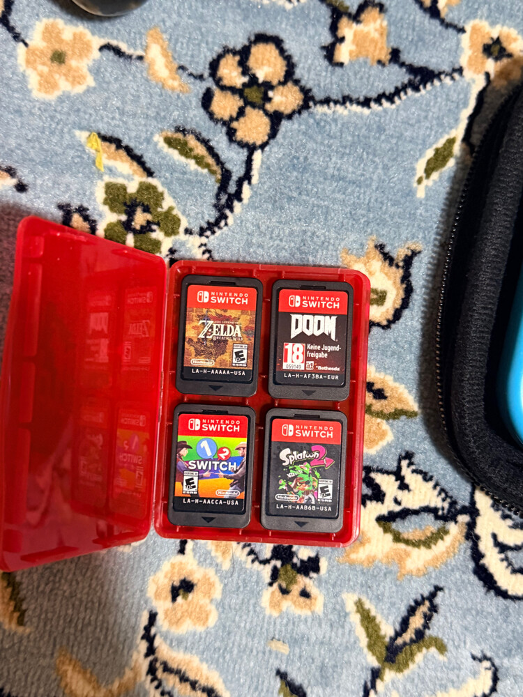 Nintendo Switch With 4 games - 2