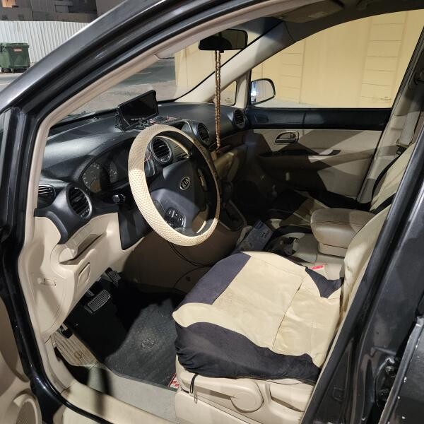 Kia Carens - 9