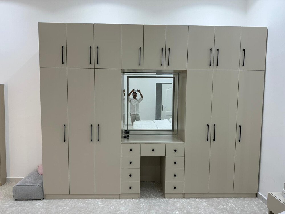 Makes New Cabinet Design  - 1