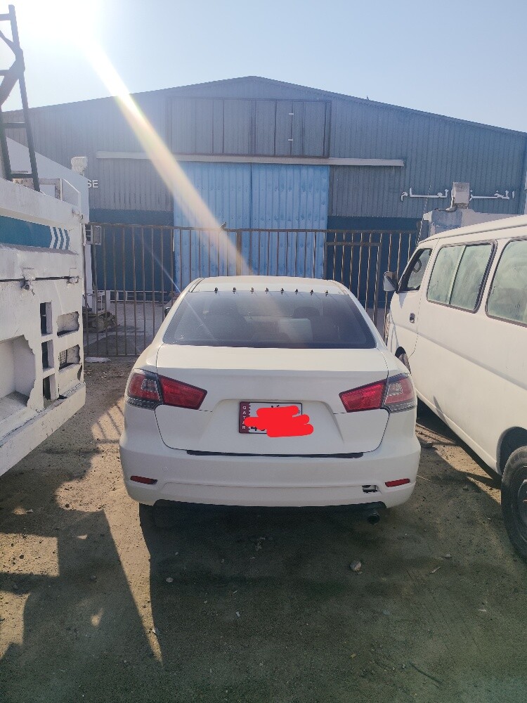Mitsubishi lancar - 1