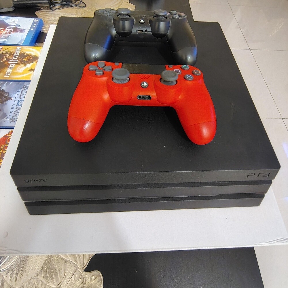 ps4 pro with 11 game cd - 1