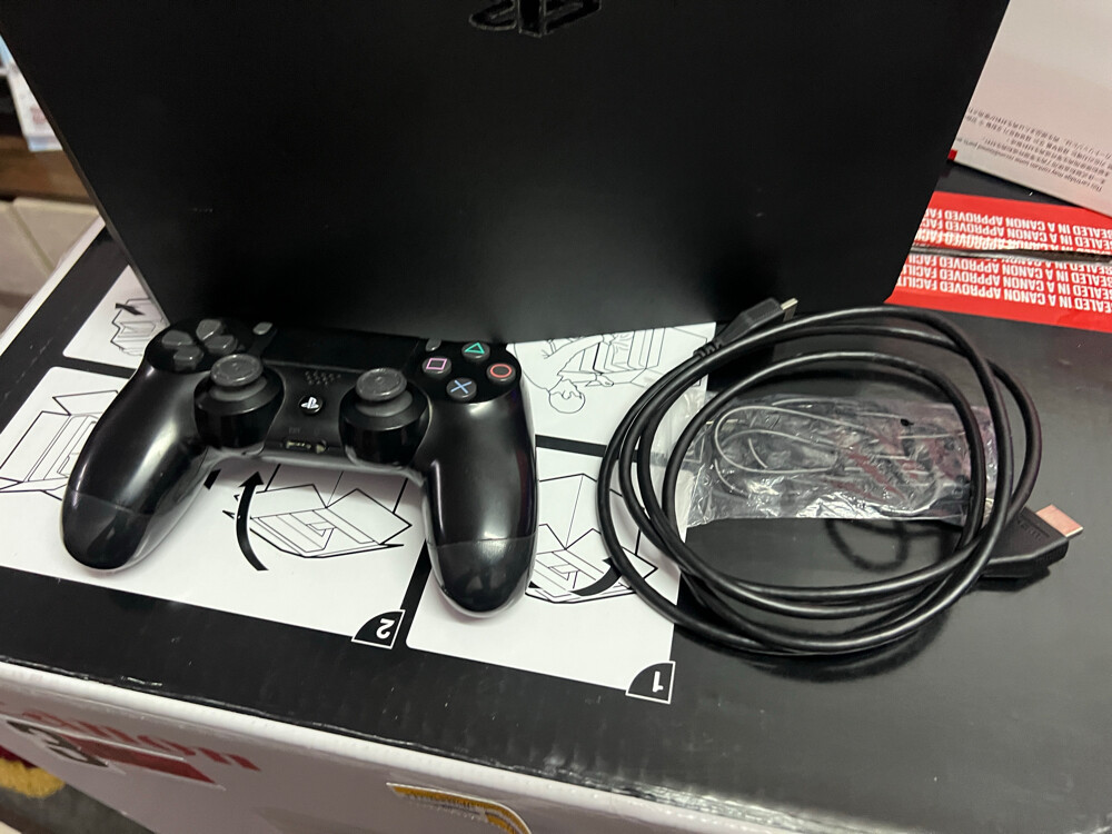 PS4 Pro 1TB Like new condition - 3