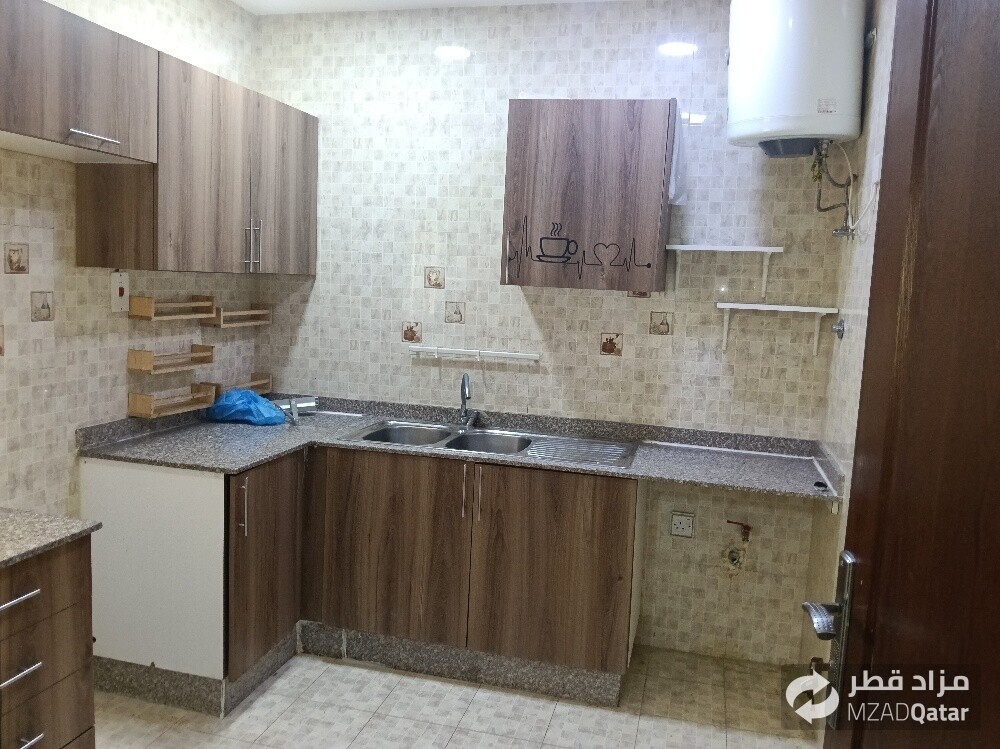 Apartment for rent in Madinat Khali - 14