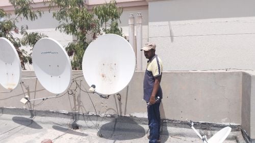 Satellite dish technician
