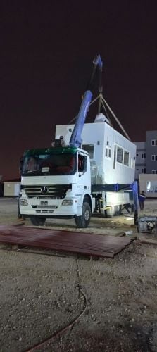 10 TAN BOOM TRUCK CRAIN FOR RENT