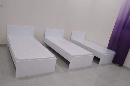 Wooden single bed