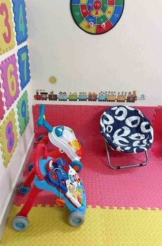 baby sitting in umm ghuwalina