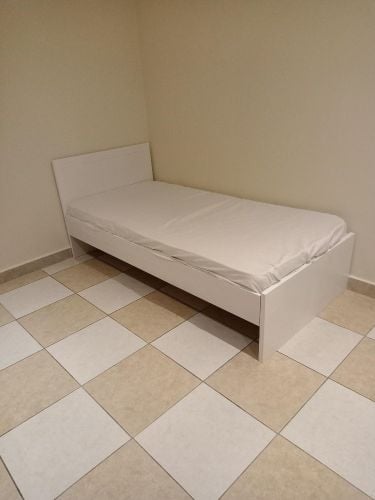 Single wooden good quality bed