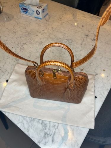SANDRA J. bag