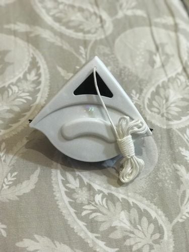 منظف ​​الزجاج ذو الوجهين