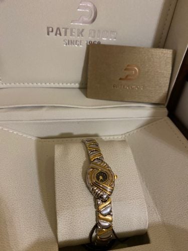 ساعه العيد مطليه ذهب صناعه سويسري