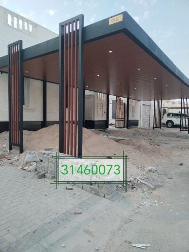 جميع أعمال الحدادة والمظلات"....