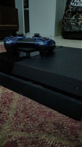playstation 4 with a joystick.