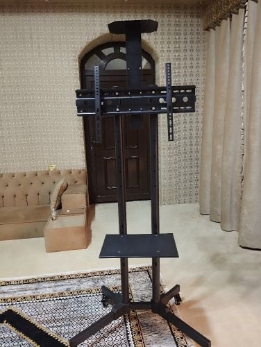 حامل تلفزيون مع عربات