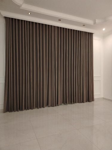 Sheer white curtains, gold tiebac