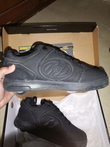 Heelys shoes with roller skate