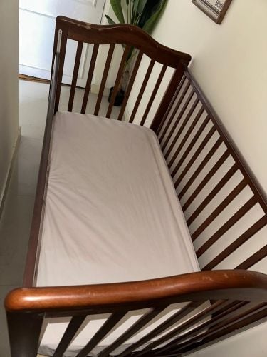 Toddler crib with mattress..