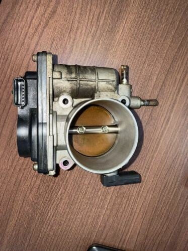 subaru lagacy throttle body